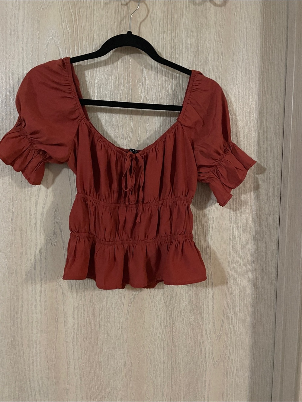 Women's Rust Smocked Peplum Short Sleeve Blouse